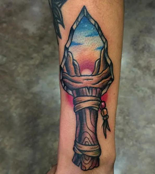 Arrowhead dagger on forearm