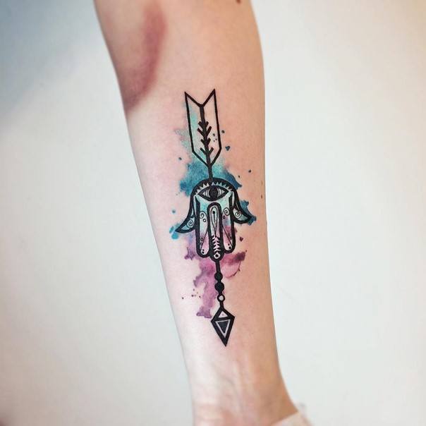 Beautiful Hamsa hand arrow tattoo