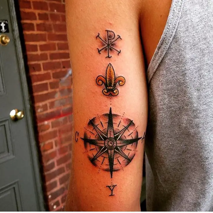 Compass-rose-with-Chi-Rho-on-back-of-arm-representing-journey-and-relationship-with-the-Good-Lord