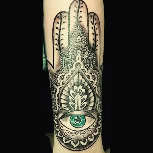 Hamsa hand tattoo protection against the evil eye