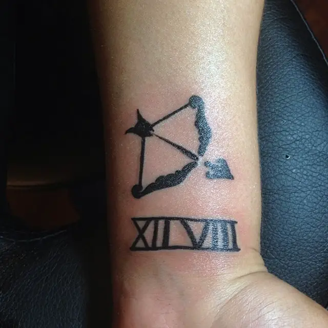 Sagittarius-bow-arrow-tattoo-on-wrist