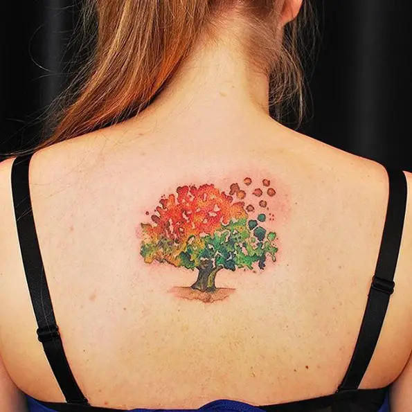 Watercolor style tree tattoo girl back