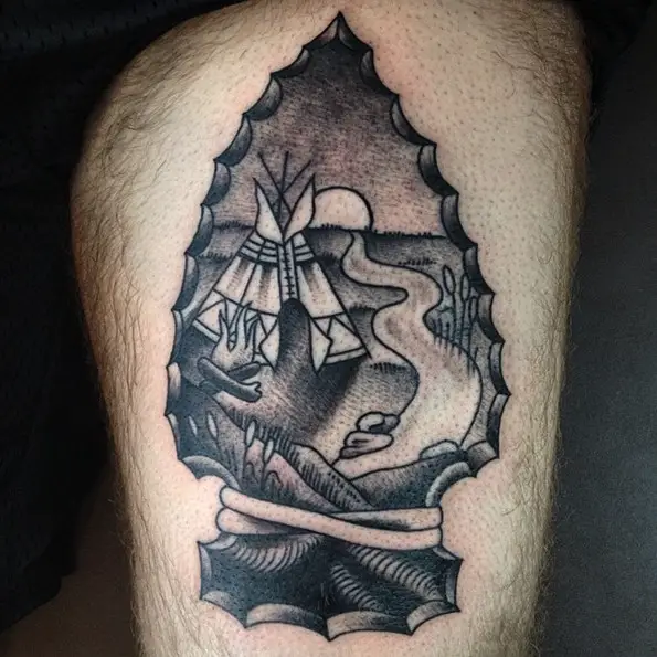 arrowhead thigh tattoo