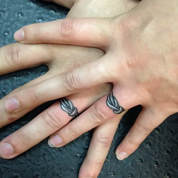 barbed wire wedding band tattoo