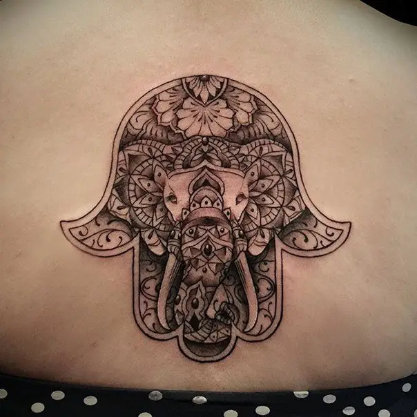 black and grey hamsa hand tattoos