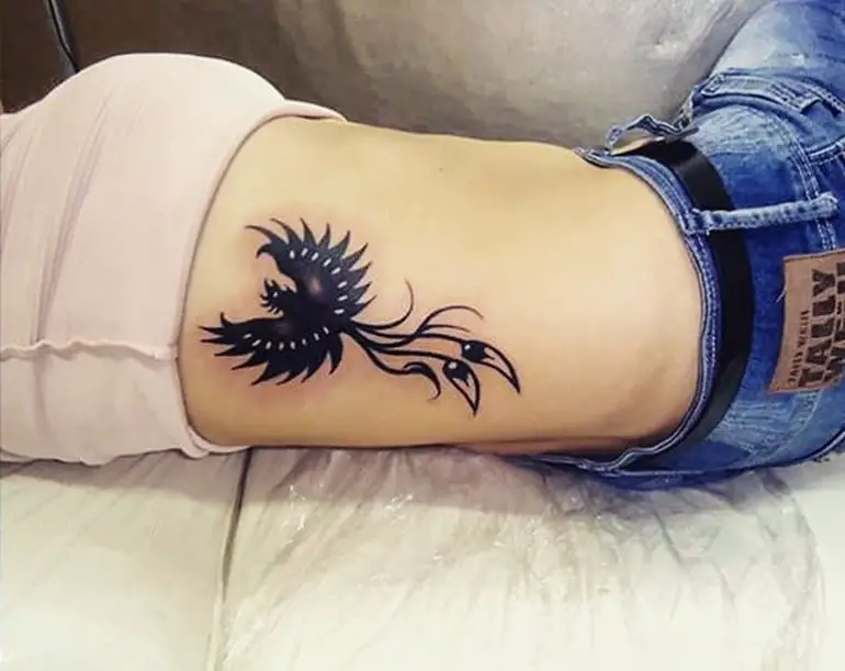 black-phoenix-tattoo-on-side