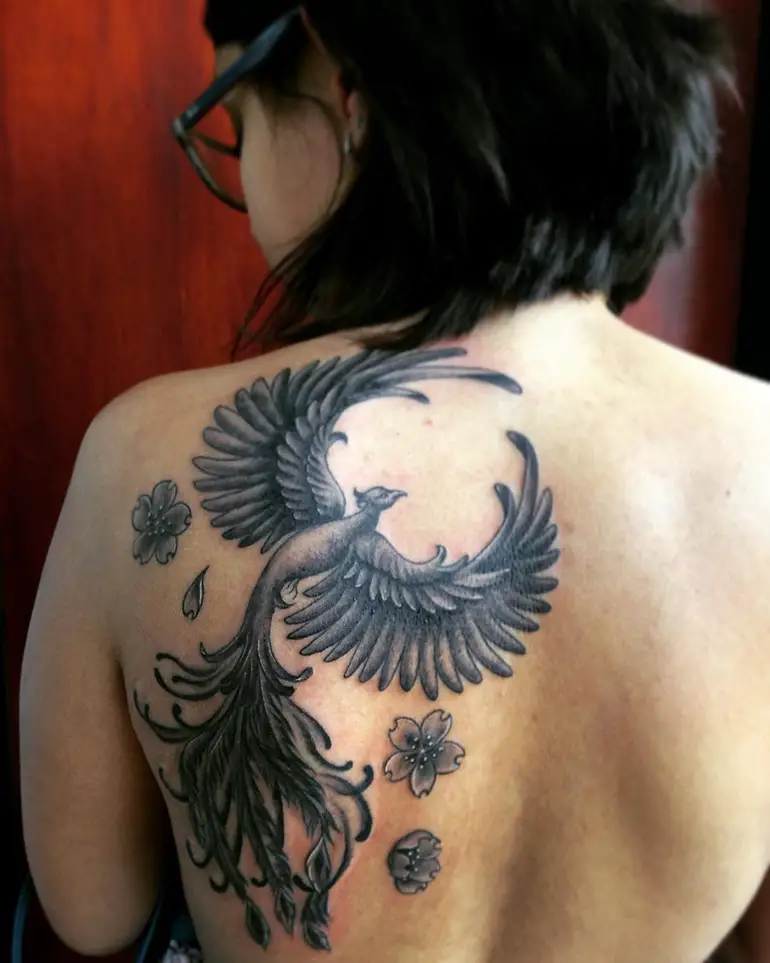 bold-phoenix-tattoo-with-sakura-flowers