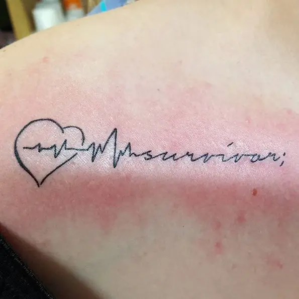collarbone heart with lifeline tattoo