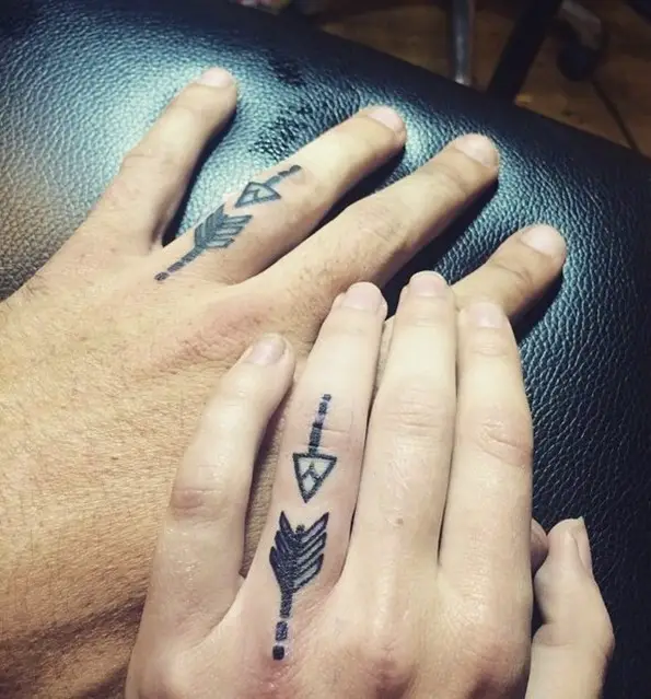 cute wedding ring arrowhead tattoo