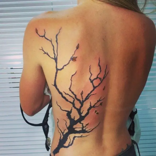 dead tree tattoo on back