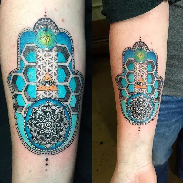 hamsa hand tattoo in color on forearm