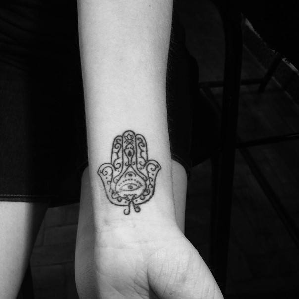 hamsa hand tattoo wrist