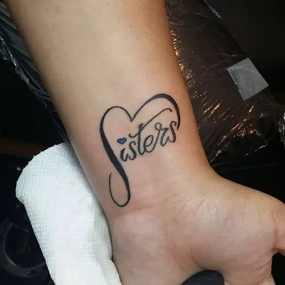heart infinity sisters tattoo on wrist
