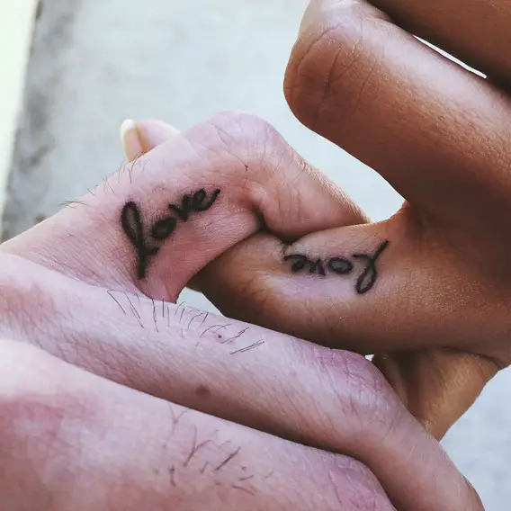 his and hers matching love word finger tattoos