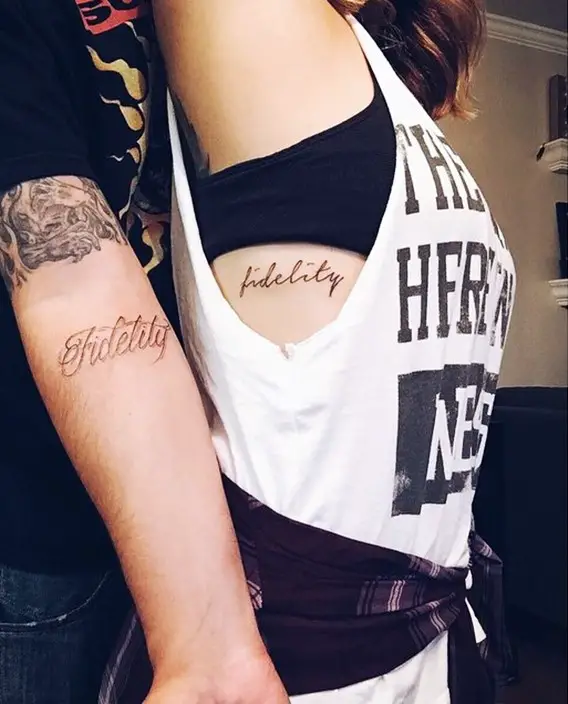 his and hers matching script tattoos