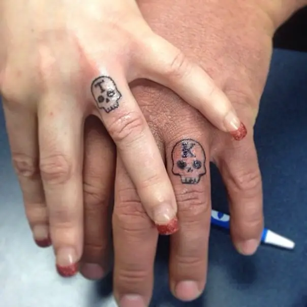 his and hers skulls wedding band tattoo initials