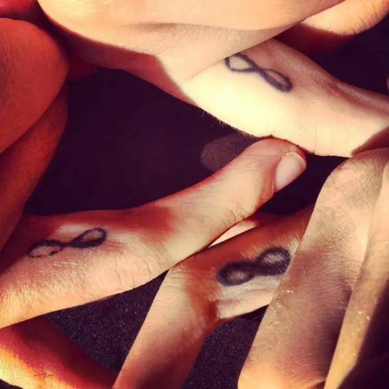 infinity finger tattoos for sisters