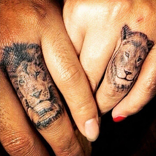 lion themed wedding ring tattoo