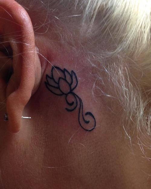lotus tattoo behind ear