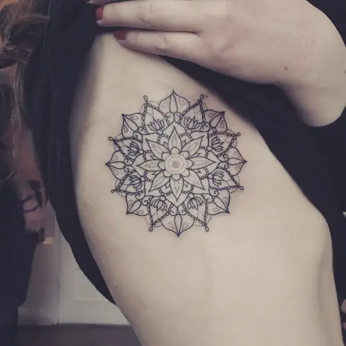 lotus flower tattoo rib