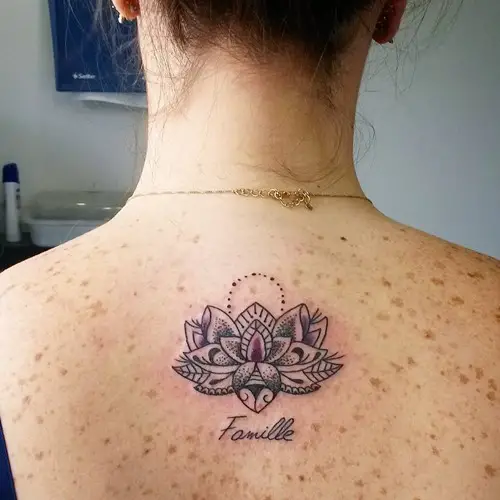 lotus flower tattoo tribute to family on back