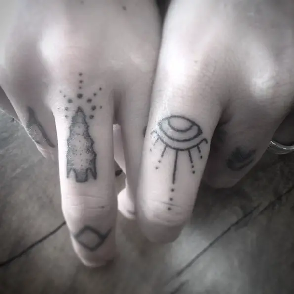 lovely and sweet arrowhead finger tattoo