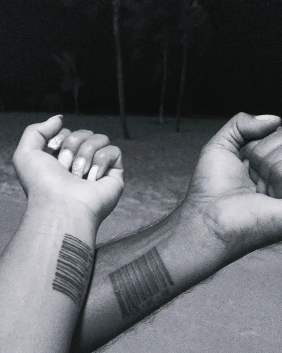 matching his and hers barcode tattoos