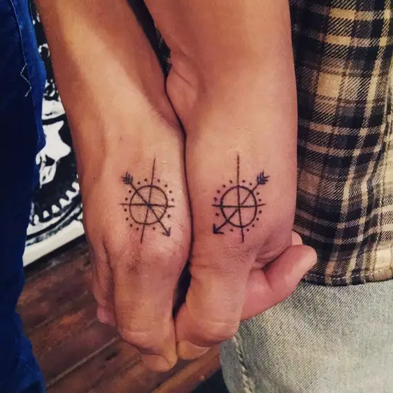 matching his and hers compass tattoos
