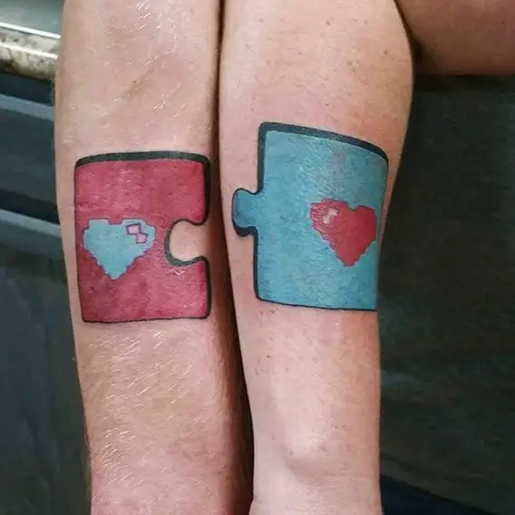 matching his and hers puzzles tattoos