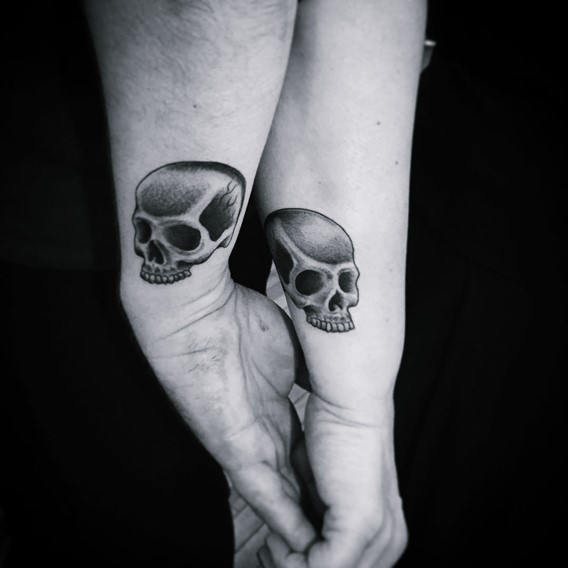 matching his and hers skull tattoos