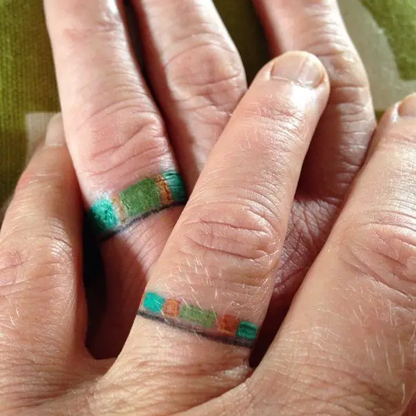 matching wedding ring finger tattoos