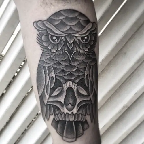neo traditional skull inside owl tattoo