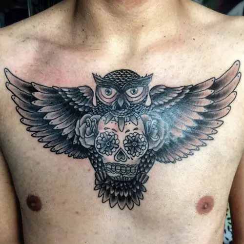 owl and skull tattoo on chest