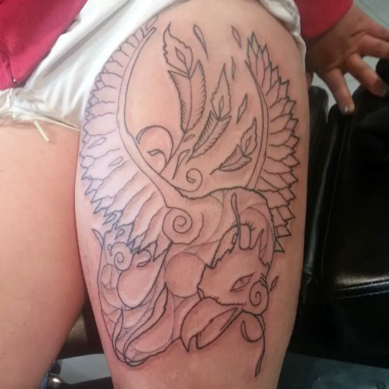 phoenix-bird-thigh-tattoo