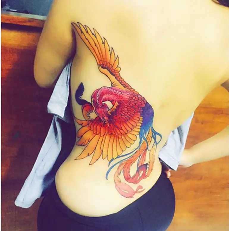 phoenix-tattoos-for-women-lower-back