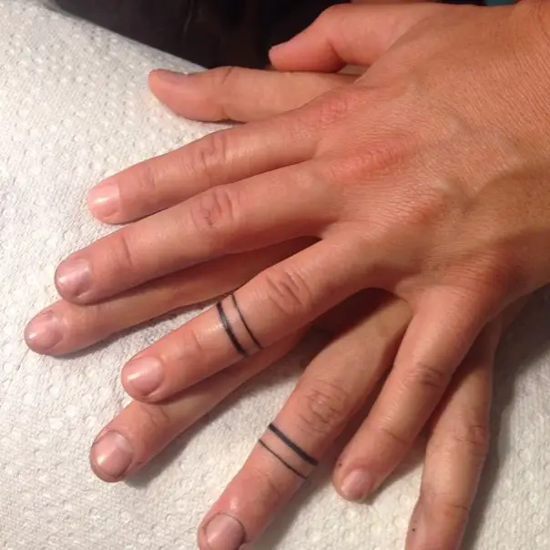 ring finger wedding band tattoos