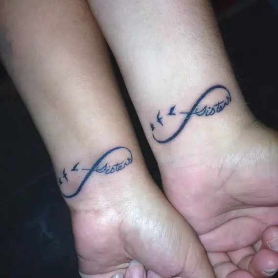 sister infinity script tattoo on wrist