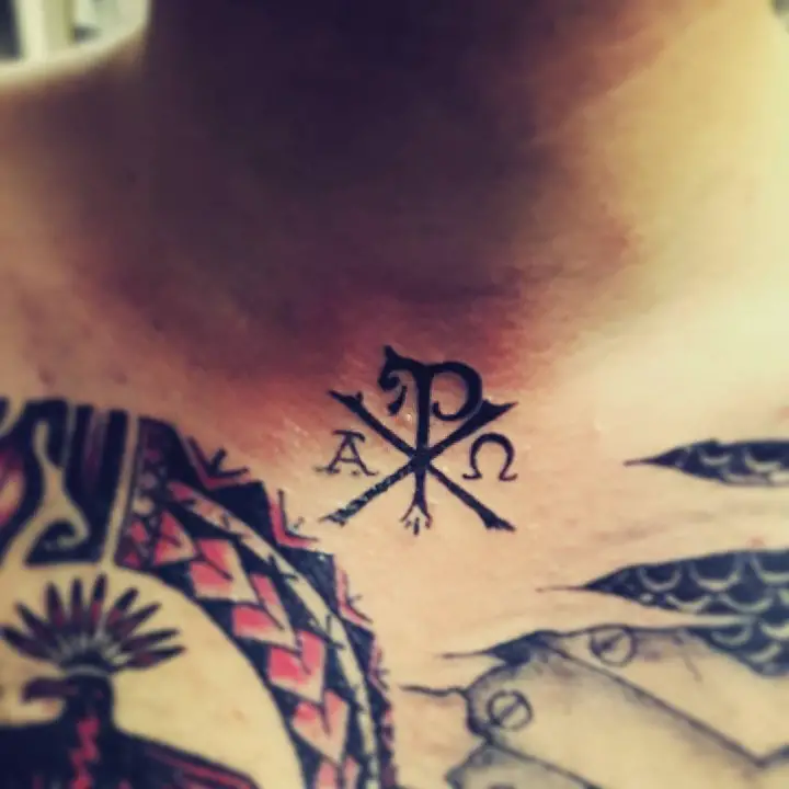 small-chi-rho-tattoo-upper-chest