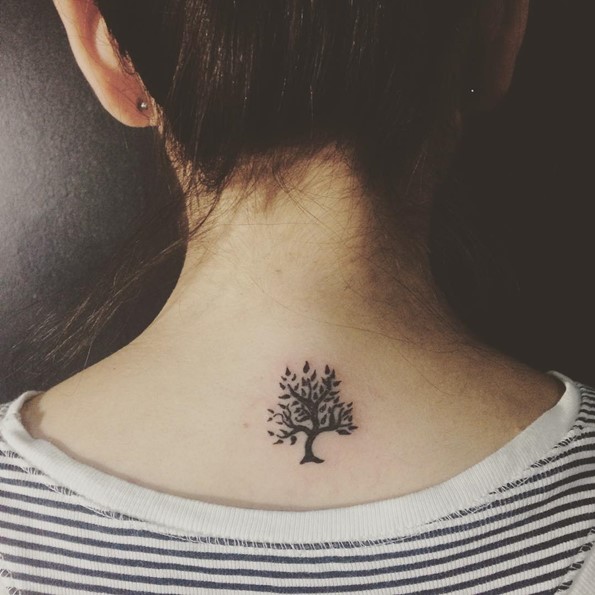 small tree tattoo on back