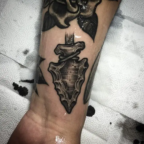 stone arrowhead tattoo designs