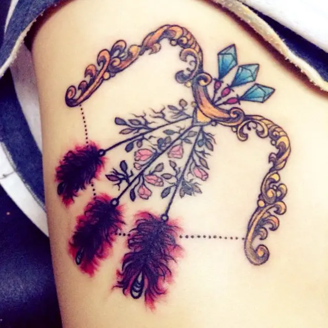 traditional-bow-and-arrow-tattoo-feathers-with-flowers