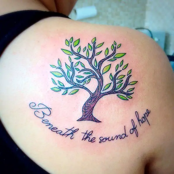 tree tattoos with words on back