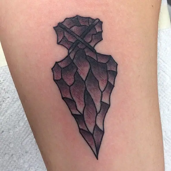 very specific arrowhead tattoos