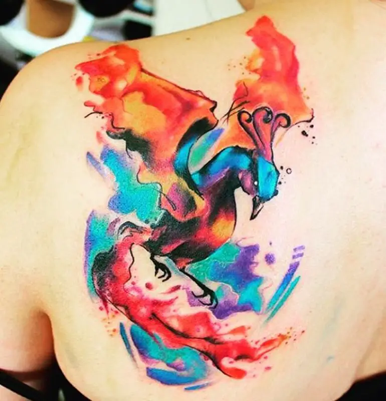 watercolor-phoenix-tattoo-placement-on-backjpg