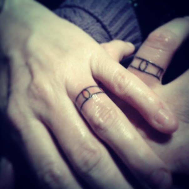 wedding ring anniversary tattoo