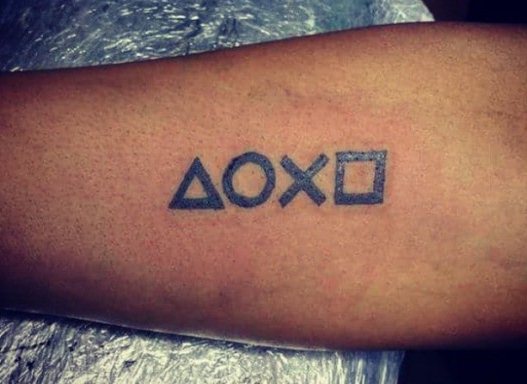 small gamer tattoo