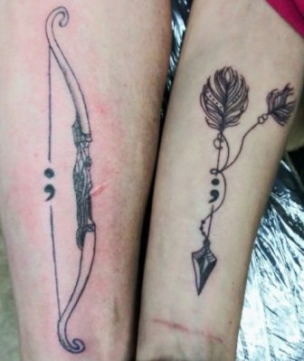 matching bow and arrow tattoo