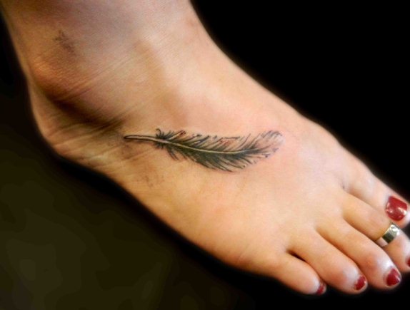 3. Small Feather Tattoos for Ladies - wide 9