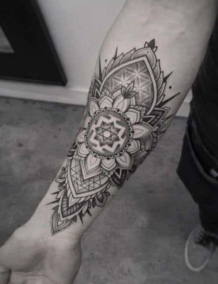 Geometric tattoos on forearm