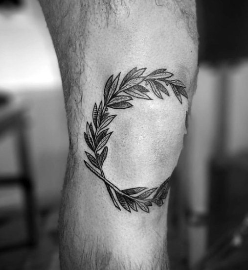 laurel wreath tattoo on knee